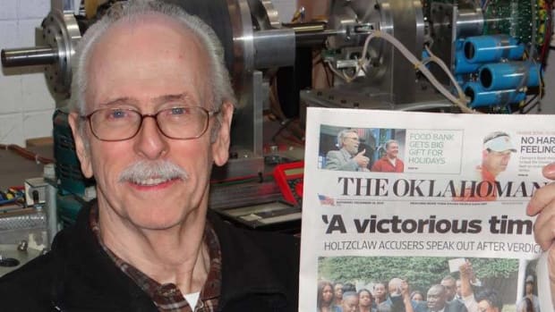 Jim Murray Holding a Newspaper from December 12, 2015 to prove he did not die in September.