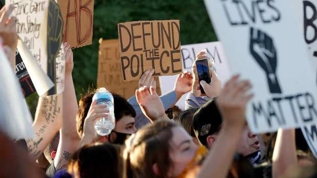 Protesters gather in Phoenix, Tuesday, June 2, 2020, for demonstrations over the death of George Floyd (AP Photo/Matt York)