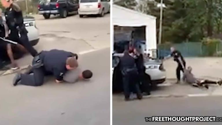 WATCH: Handcuffed Teen Dragged Around by Hoodie As Cops Try to Steal Kid's Phone for Recording
