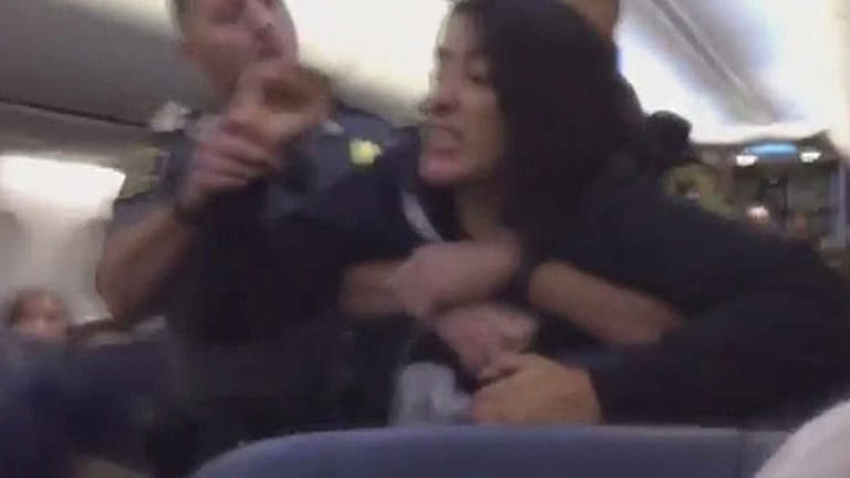 WATCH: Cops Drag Woman Off Airplane Over Pet Allergy Complaint