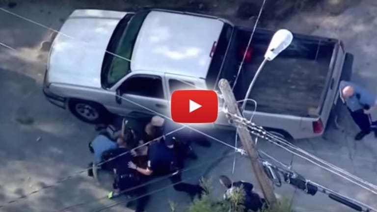 Graphic Video Shows Onslaught of Cops Savagely Maul a Surrendering 50-Year-Old Man