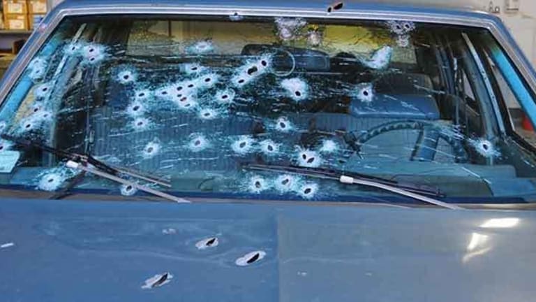Text Messages Show Officers Who Shot 137 Rounds Into Car Knew Suspects Were Unarmed