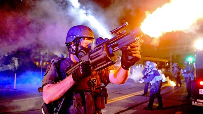 In Light of Recent Attacks on Police, White House Considers Re-Militarization of American Cops