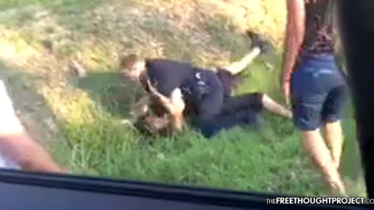 VIDEO: Cop Responds to Wreck by Throwing Man Down, Beating Him and a Bystander