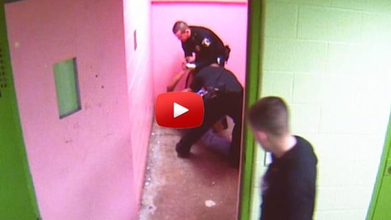 Judge Drops Charges Against Two Cops Caught On Camera Pummeling a Handcuffed Man