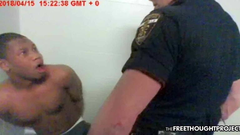 WATCH: Cop Flips Out in Apparent Roid Rage, Beats Handcuffed Teen and Starts Smashing Things