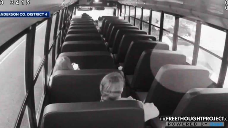 WATCH: Distracted Cop Forgets to Brake, Clips Child Waiting for a Bus