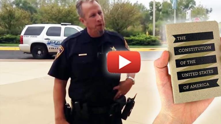 Disturbing Video Shows Cop Threaten to "Lock Up" College Kids for Handing Out Pocket Constitutions