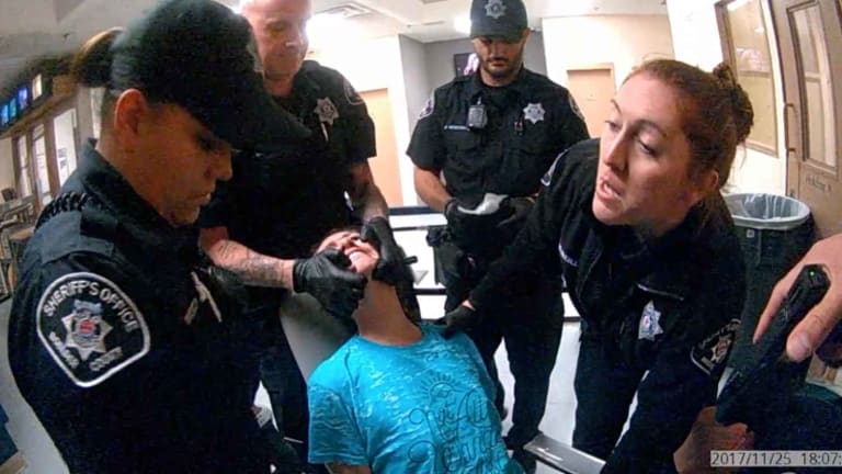 WATCH: Cops Strap Woman to a Chair, Torture Her with Taser Over Refusing to Sign a Ticket