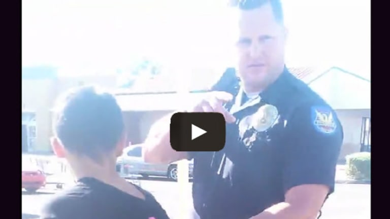 Did that Cop Just Make Sure He Was On Camera Before Beating Up On a Little Kid?