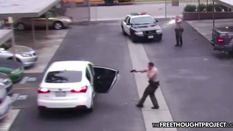 Disturbing Video Shows Unarmed Father of 3 Executed by 2 Cops Who Shot Him 34 Times