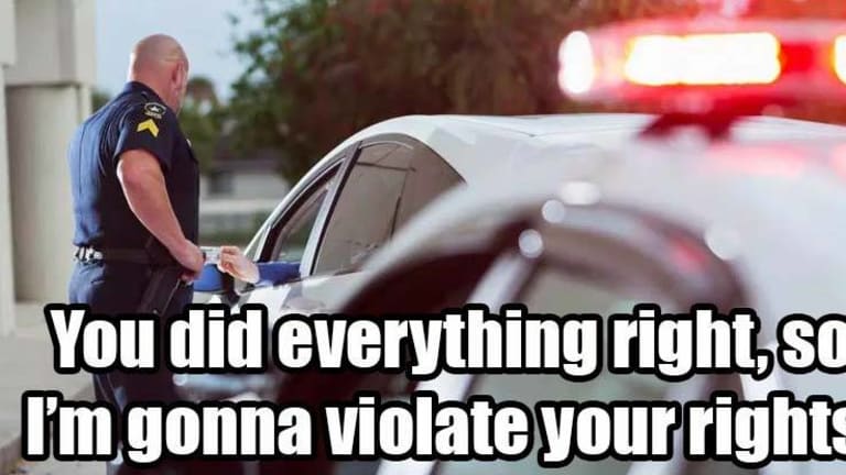 "Generosity" at Gunpoint? Cops Now Pull You Over for "Driving Safely" to "Reward" You