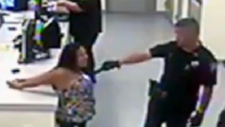 Karma? Cop Who Tasered Handcuffed Woman in her Heart, Receives a Hefty Beat Down