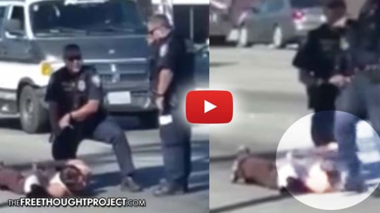 Disturbing Video Shows a Cop Kneel on Handcuffed Man, As Another Cop Kicks Him in the Face