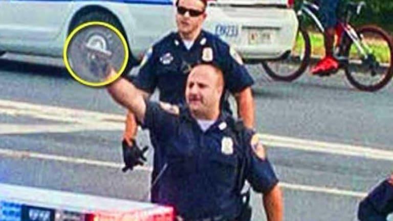 Domestic Terrorism: Cop Caught Aiming Gun at a Crowd of Hundreds of Innocent People