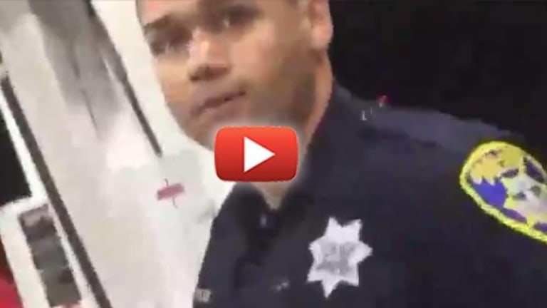 Unsettling Video Shows Oakland Cop Spit on a Man for Filming Him