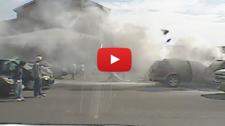 Caught on Video: Selfless Police Officer Pulls Unconscious Man from Burning Vehicle