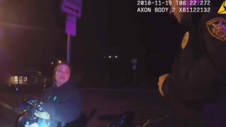 WATCH: Cops Ticket, Arrest Disabled Woman for Legally Riding Her Assistive Scooter on the Sidewalk
