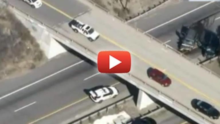Cops Shoot at a Fleeing Vehicle in Traffic from a Helicopter, Causing Head-On Collision