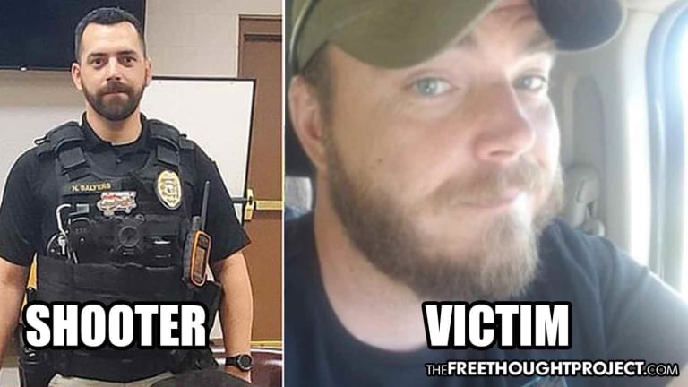 Cop Who Threatened to 'Shoot Protesters Through the Door' Shot Fellow Cop Through the Door Instead