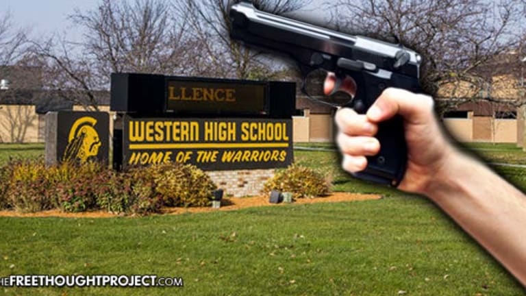 School Cop Fires Gun in School for No Reason, Hitting a Teacher in the Neck -- Not Arrested