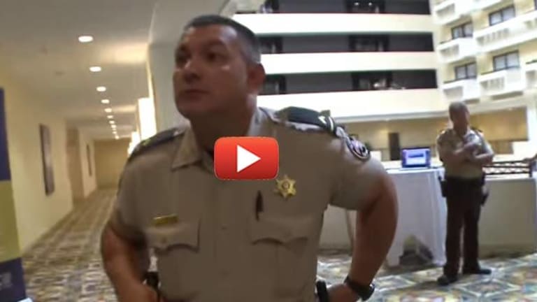 The Reason Behind these 4 Cops Kicking Reporters Out of a Hotel Will Infuriate You