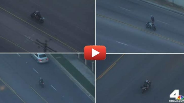 WATCH: Motorcyclist Taunts Police as he Performs Dangerous Stunts During High-Speed Chase