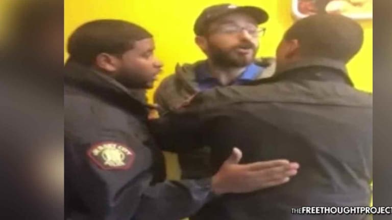 WATCH: Cops Angry Over Late Pizza, Storm Domino's and Attack the Manager