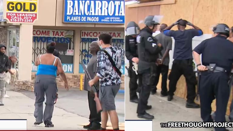 On LIVE TV Cops Detain Armed Store Owners Protecting Store As Looters Run Off