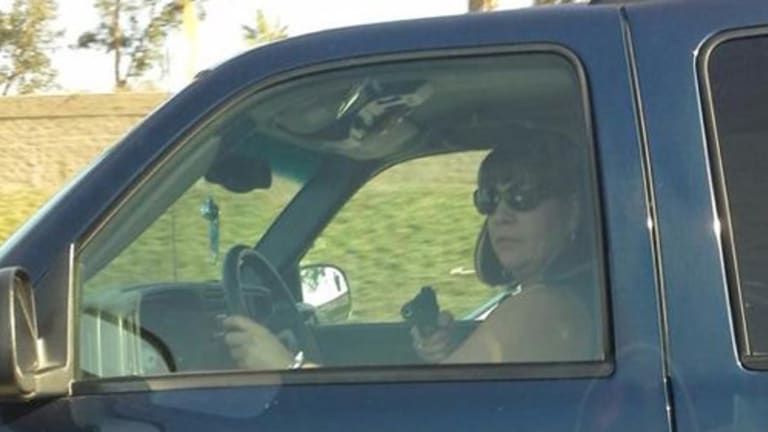 Motorist Photographs Off-Duty Cop as She Pulls Gun While Driving Down Freeway