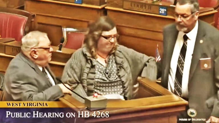 WATCH: Security Drags Woman from Hearing for Exposing Big Oil Bribes to Politicians