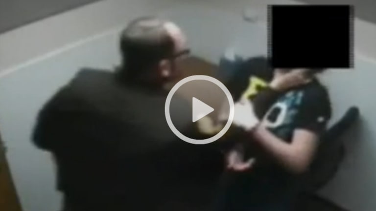 Cop Caught on Video Attacking Defenseless Handcuffed Girl is Suing the City for Lost Pay