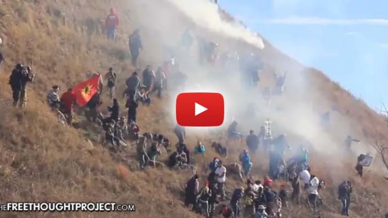 Video: Cops Fire Tear Gas on Water Protecters as They Attempt to Reclaim Sacred Land