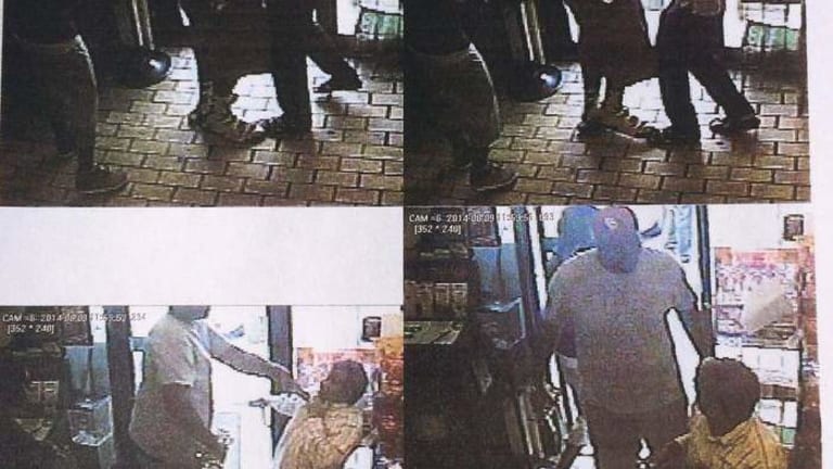 Breaking: PHOTOS RELEASED of Suspect Michael Brown ROBBING STORE Before Shooting