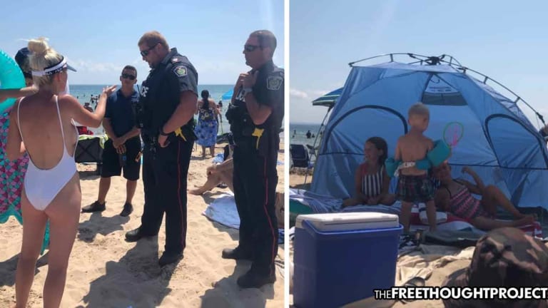 WATCH: Hero Cops 'Protect' the Public By Kicking Family Off Beach for Shading Kids with a Tent