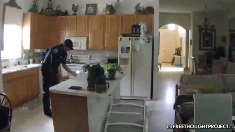 Cop Caught on Video Breaking into Elderly Man's Home, Stealing Cash & Prescription Drugs