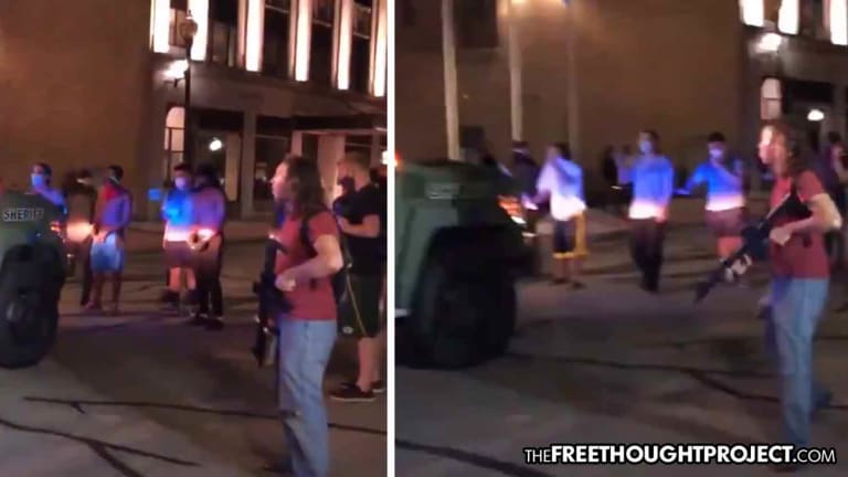 WATCH: Protesters Armed with AR-15s Corner Kenosha Police During Violent Protests