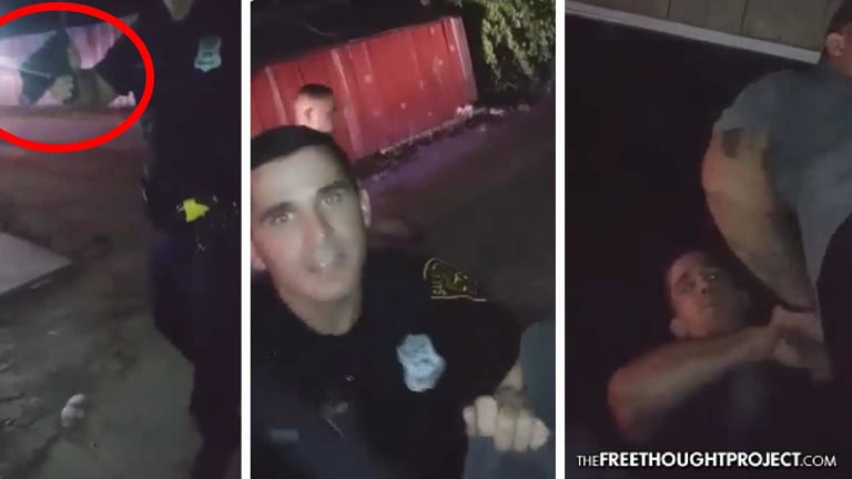 EXCLUSIVE: Cop Caught on Video Holding Man at Gunpoint for Filming on His Own Property
