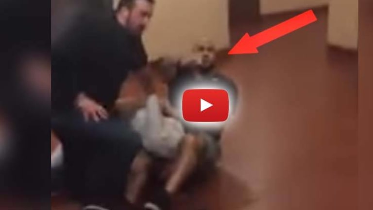 VIDEO: Raging Cop Pulls Gun on Innocent Bystanders, Punches Man Because they Were Filming Him