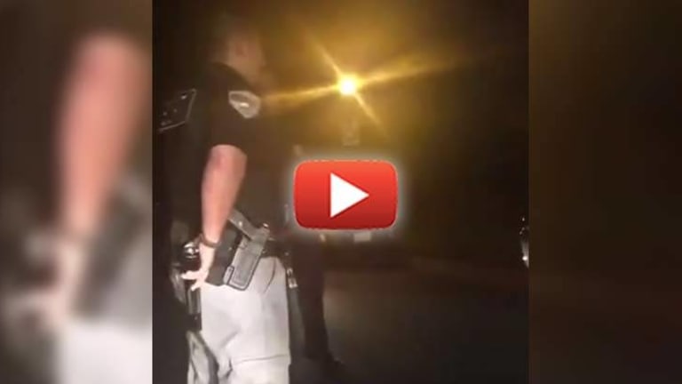 SHOCK VIDEO: Cop Upholds Constitution, Prevents Detained Citizens from Being Searched & Accosted