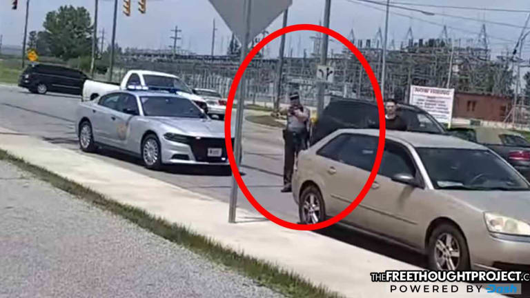 WATCH: Cop Doesn't Like Being Filmed, So He Pulls His Gun On Guy With Camera