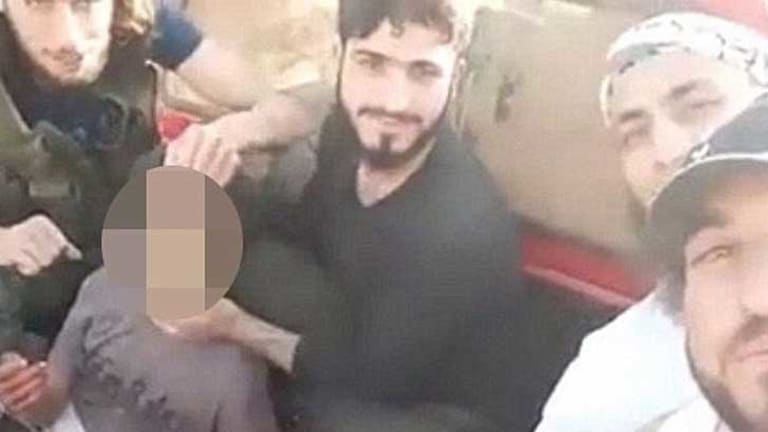 US-Funded "Moderate Rebels" Film Themselves Beheading a Child