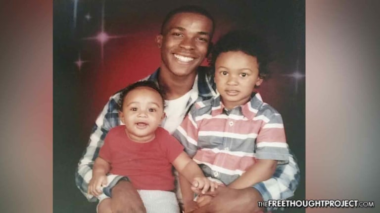 Cops Shoot Unarmed Dad In The Back, Kill Him For Holding a Phone in His Grandparents' Backyard