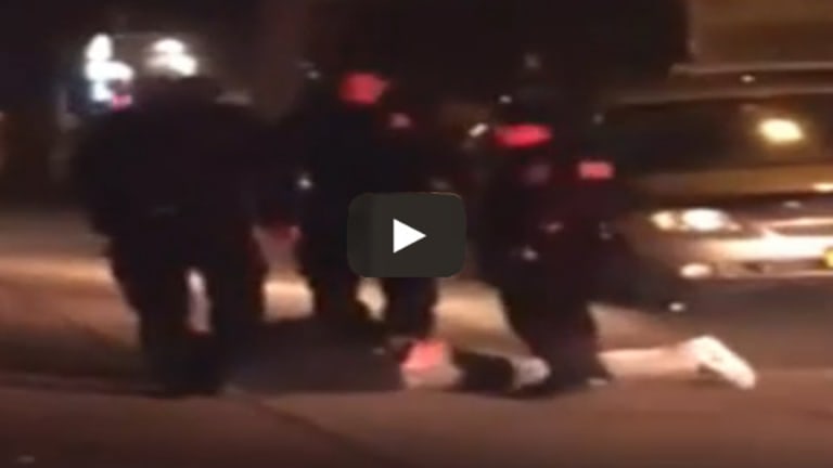 Cops Caught on Video Kicking and Punching a Handcuffed Man Lying Face Down
