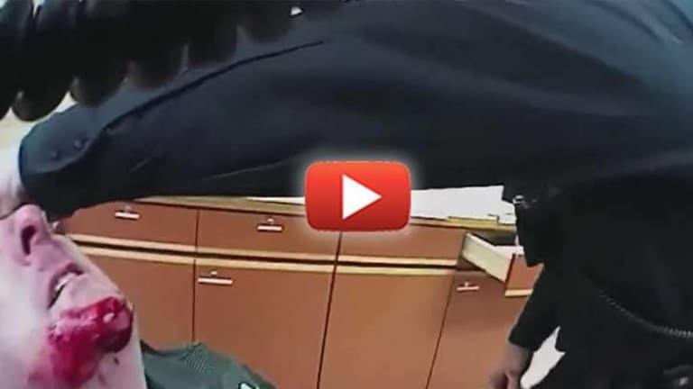 Video Catches Cop on Rampage as Fellow Cops Try to Stop Him from Torturing Handcuffed Man