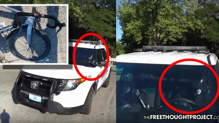 WATCH: Cop Looking at His Phone Plows Into Cyclist Sitting at a Stop Sign
