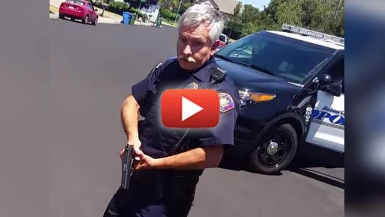 Crazed Cop Stalks Man then Pulls a Gun on Him for Filming from his Own Front Yard