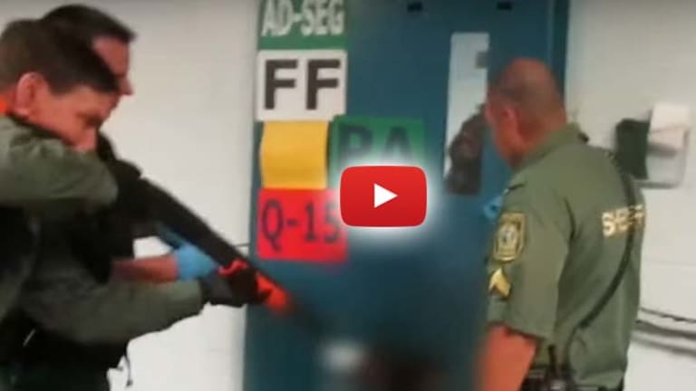 Gruesome Video Shows Cops Shoot Mentally Ill Man in Groin Through Cell Door with Shotgun