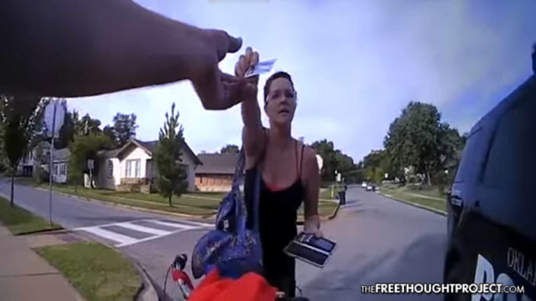 WATCH: Cowardly Cop Cuffs Innocent Woman Claiming She 'Used Her ID as a WEAPON'