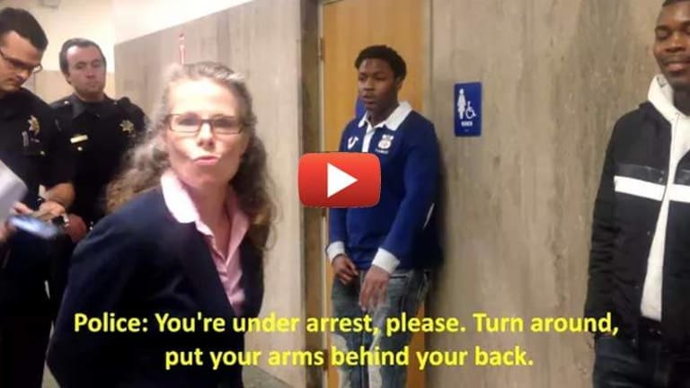 Bully Cop Arrests Public Defender for Trying to Protect Her Client's Constitutional Rights